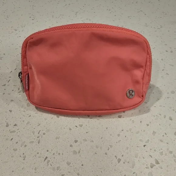 Lululemon Pink Crossbody Bag with Signature Silver Tone Lululemon Logo - Picture 1 of 9